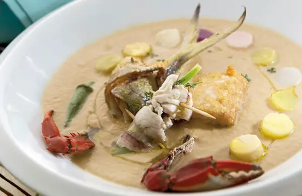 White bowl of creamy seafood stew
