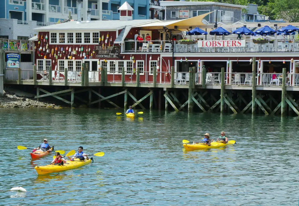 Bar Harbor Town Pier with kayakers in the water