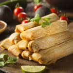 Tamales piled up in a pyramid