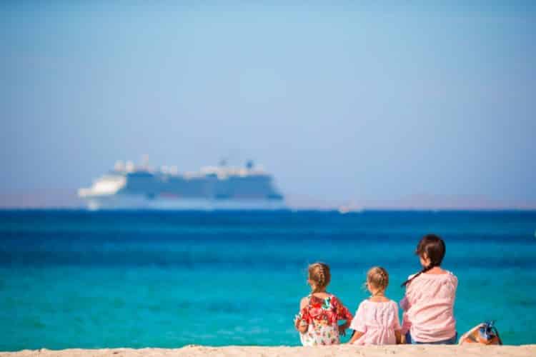 family looking at cruise ship