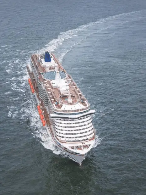 Aerial view of Iona cruising through the water