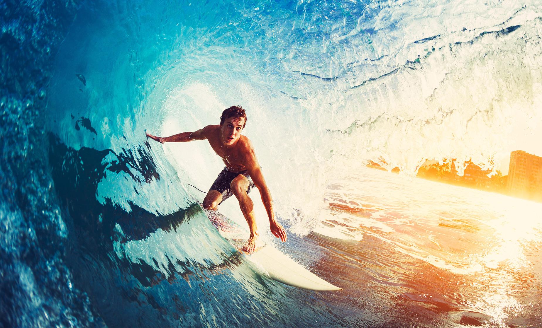 Surfer inside a big wave