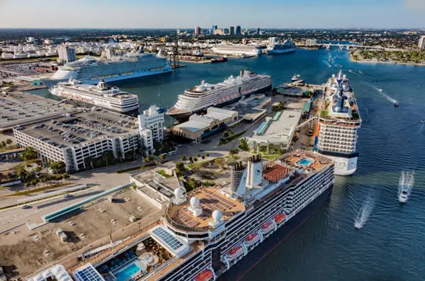Aerial view of Port Everglades with multiple cruise ships docked.