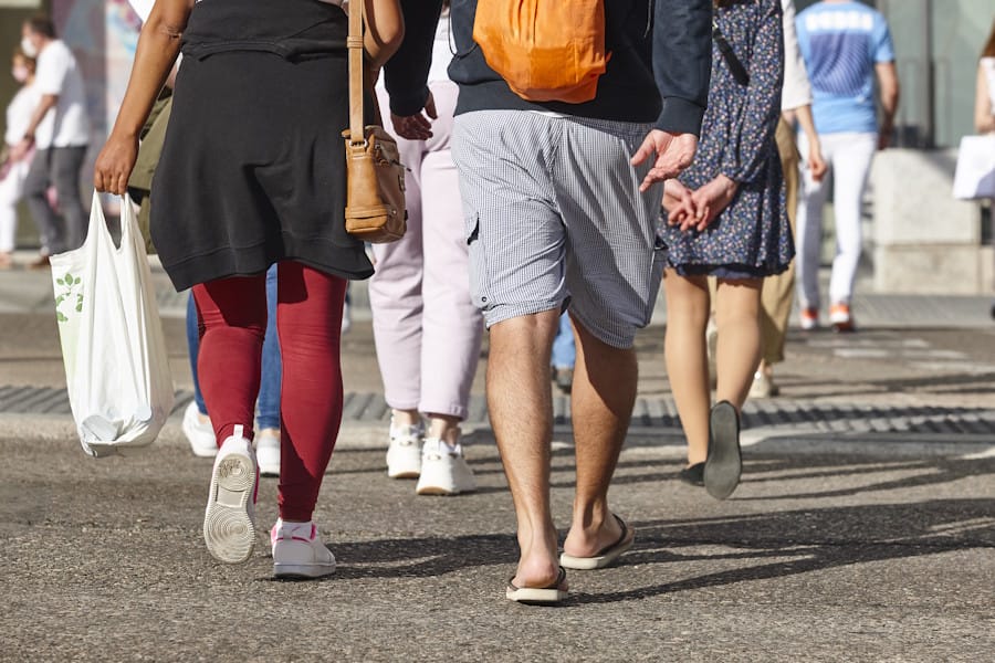 people walking down the street.